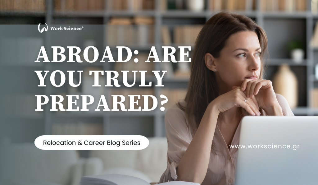 A thoughtful woman sits at a desk with a laptop, looking off to the side, with her hand on her chin, against a blurred background of bookshelves. The text overlay asks: "ABROAD: ARE YOU TRULY PREPARED?" and is subtitled "Relocation & Career Blog Series."