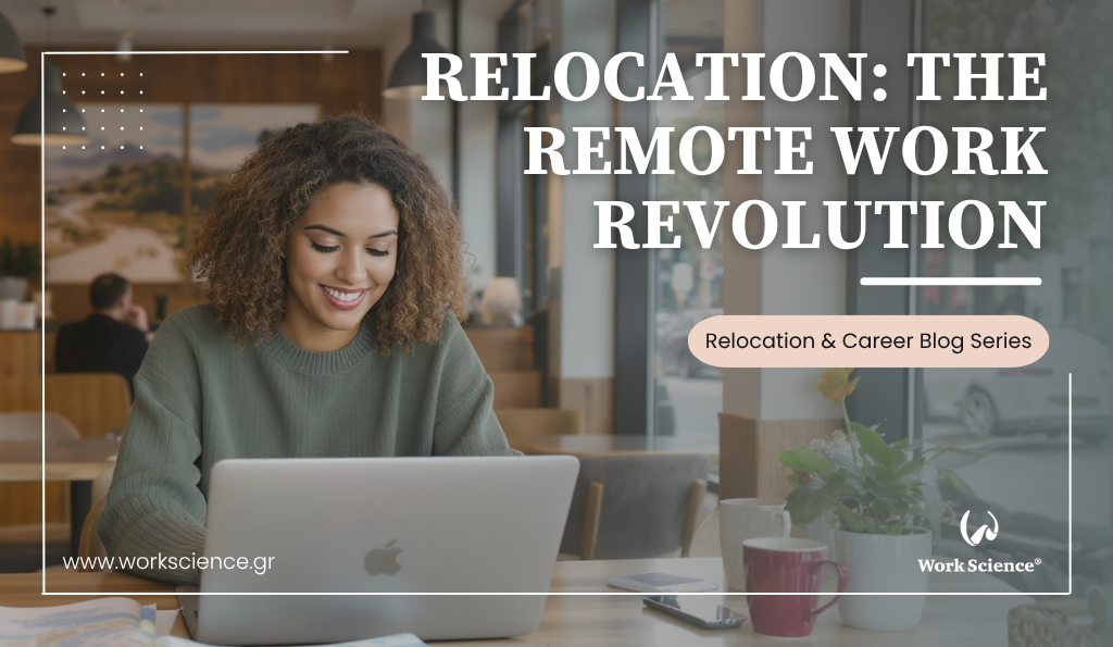 A cheerful woman working remotely in a modern café, looking at her laptop with a pleased expression, with a cup of coffee and open notebook on the table.